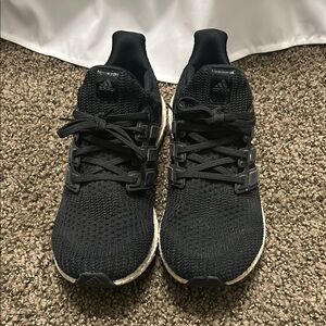 adidas Black Athletic Shoes with Breathable Knit Upper and Curved Sole